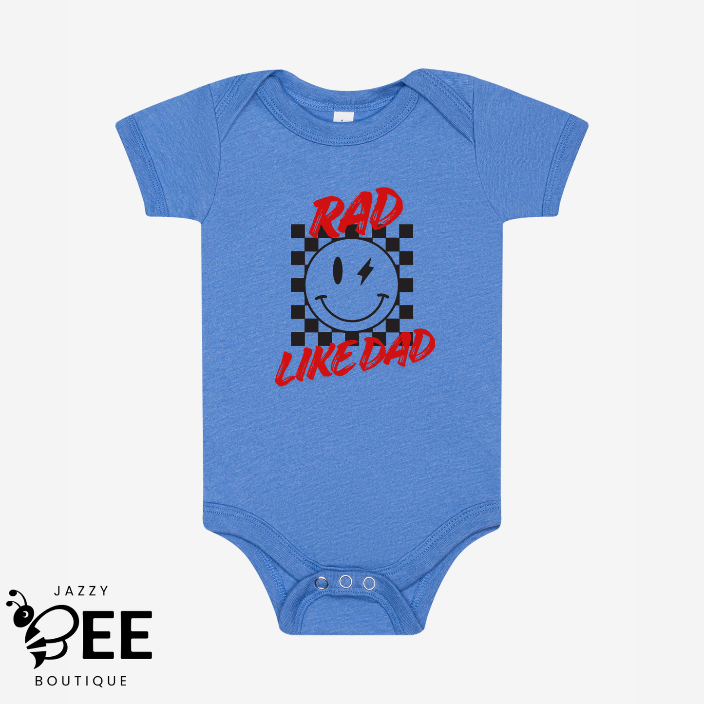 Blue baby onesie with a smiley face and text on a white background, featuring the brand 'Jazzy Bee Boutique'.