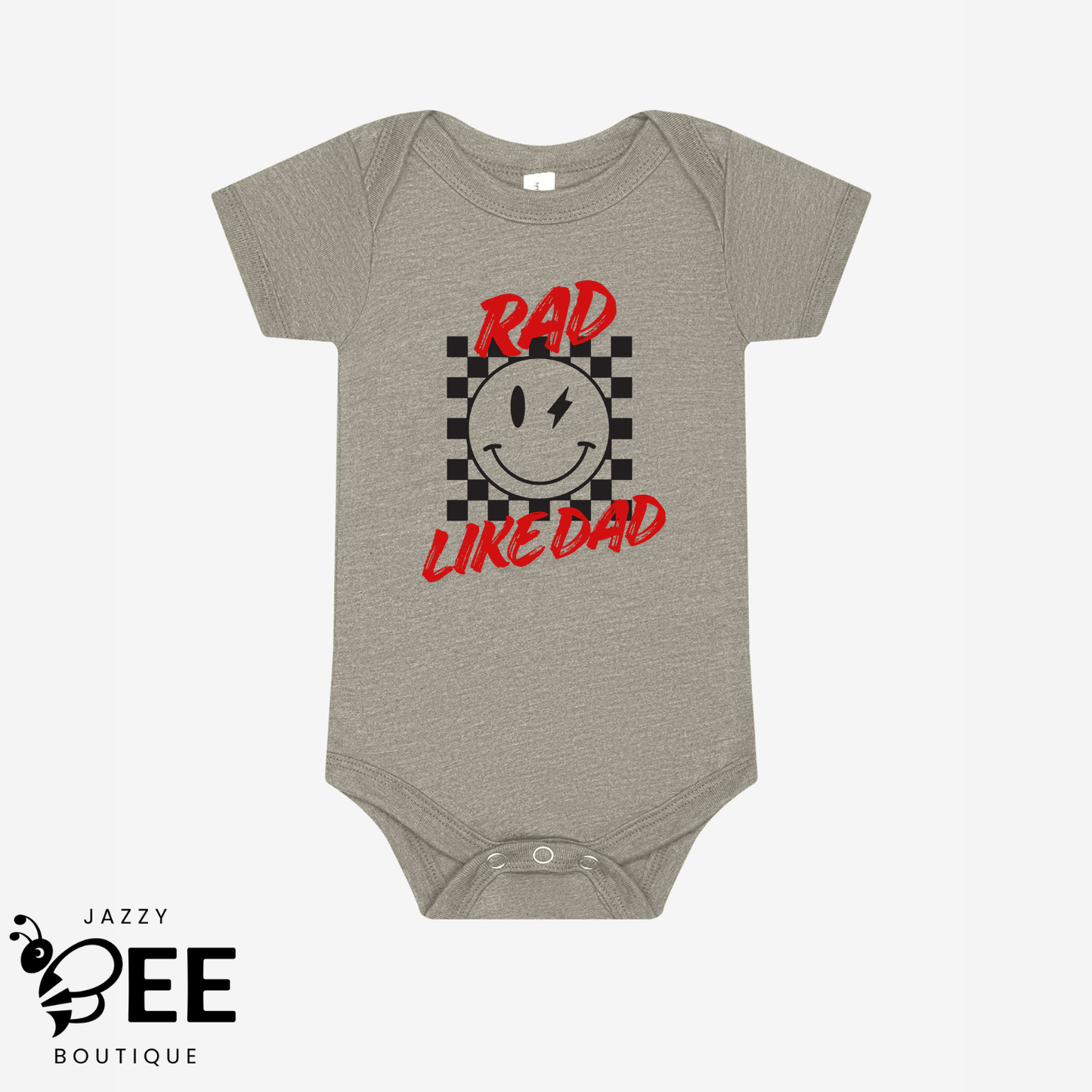 Gray baby onesie with a smiley face and text design on a white background, featuring the brand 'Jazzy Bee Boutique'.