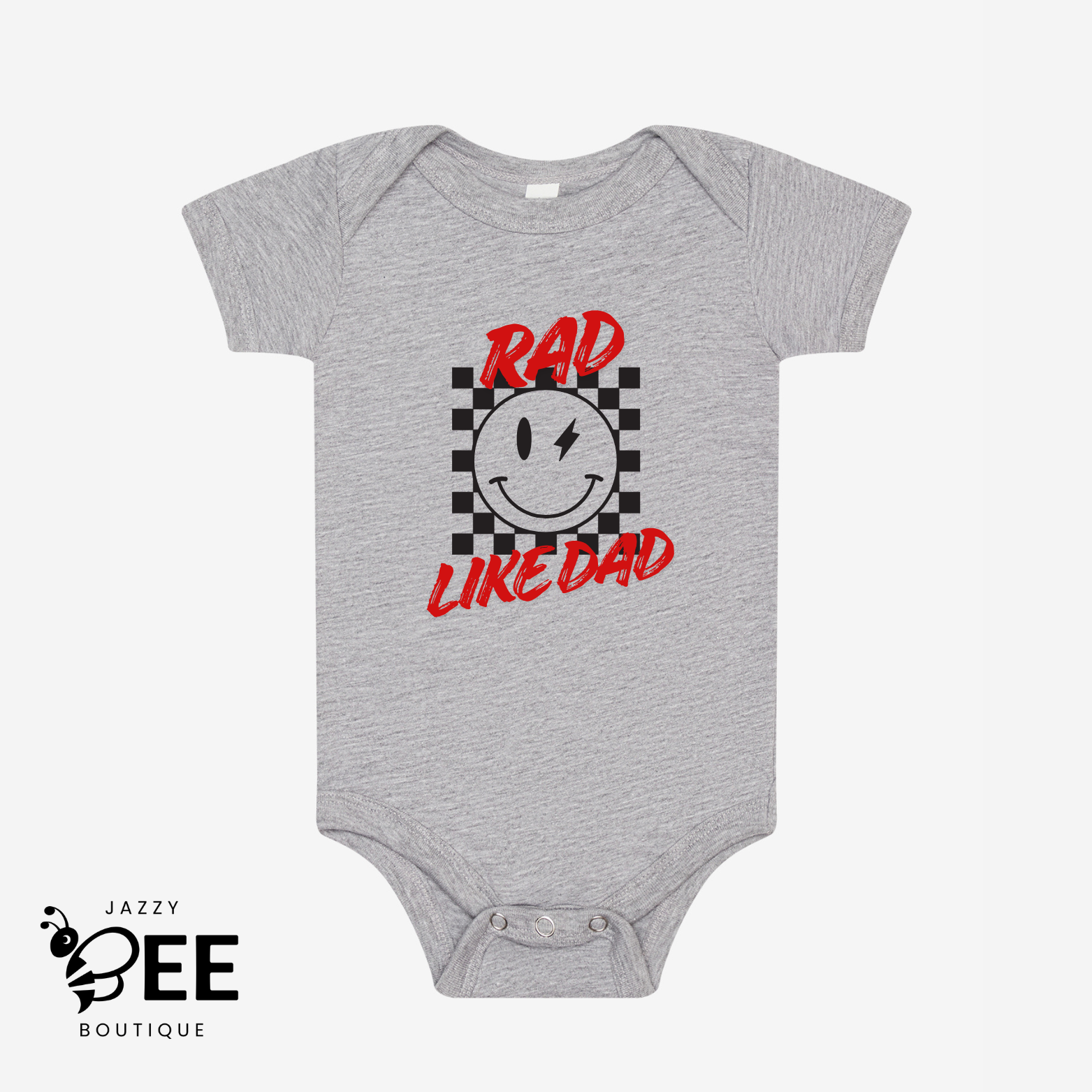 Light gray baby onesie with a smiley face and 'Rad Like Dad' text on a white background, featuring the Jazzy Bee Boutique logo.